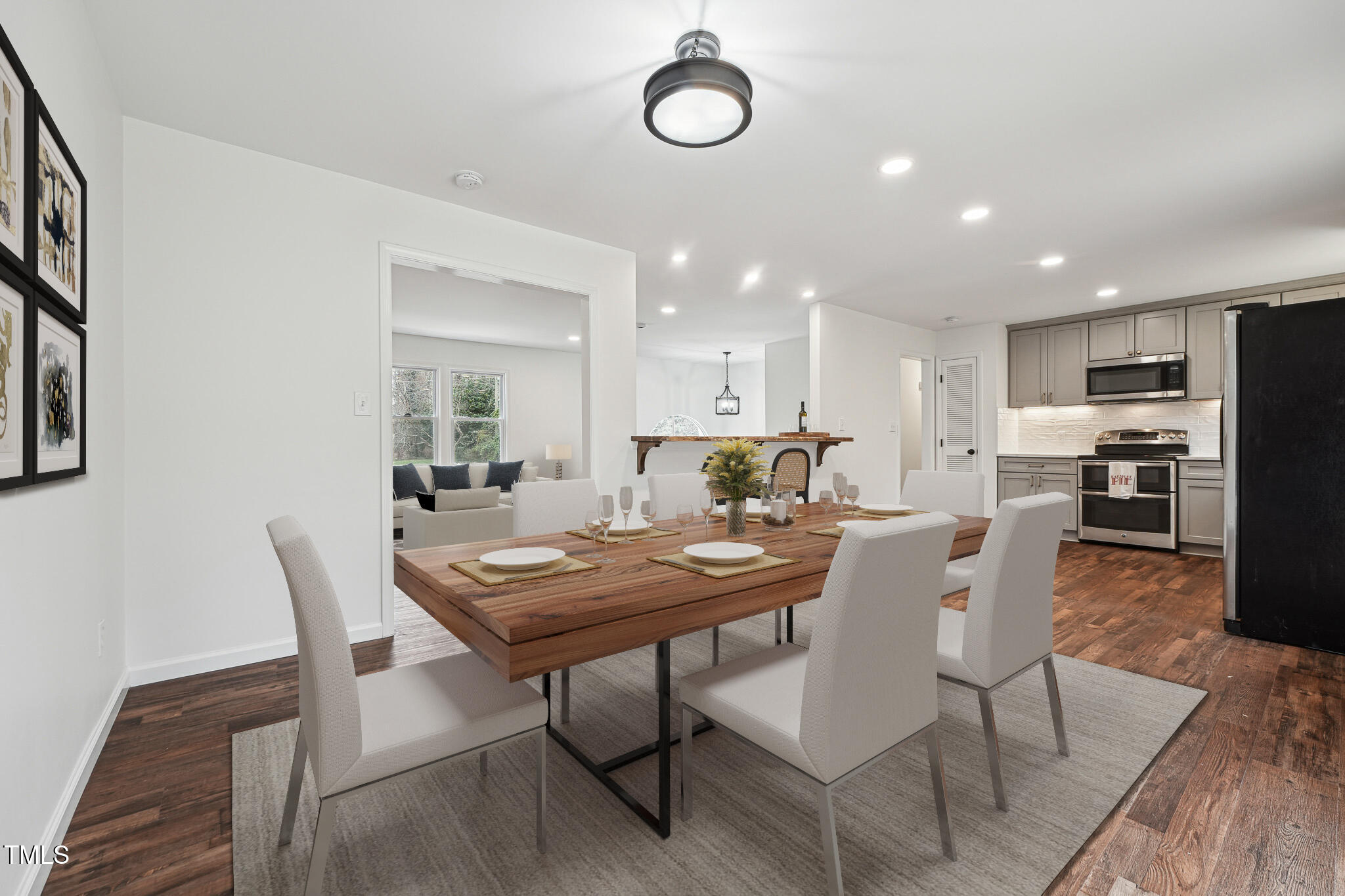 109 Chatterson Drive Raleigh, NC 27615 - Photo 9 of 51 a view of a dining room with furniture