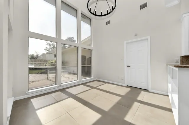 a view of a room with windows