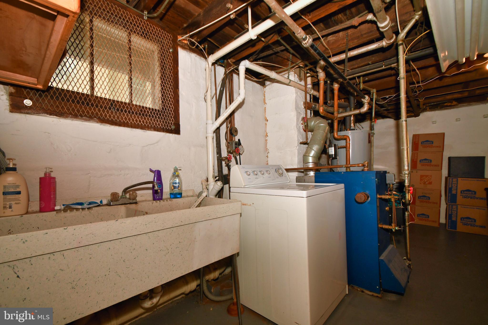408 Walcott Road Baltimore, MD 21206 - Photo 35 of 39 back basement storage area