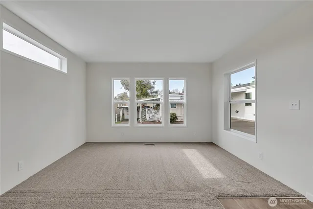 an empty room with windows