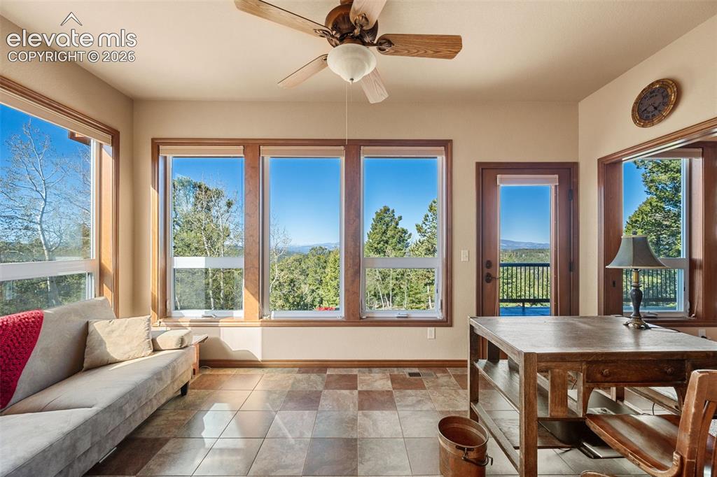 131 Paradiso Road Divide, CO 80814 - Photo 28 of 50 a living room with furniture and a large window