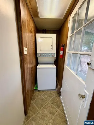 a view of a storage and utility room with a sink