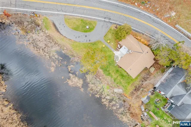 a view of swimming pool with a yard