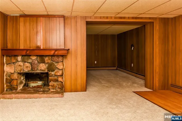 a view of a door and an empty room