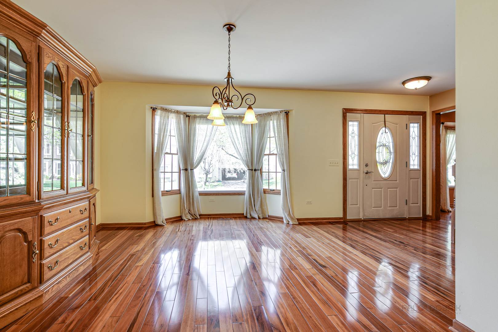 4727 Middle Road Gurnee, IL 60031 - Photo 12 of 29 a view of a room with wooden floor fireplace and windows