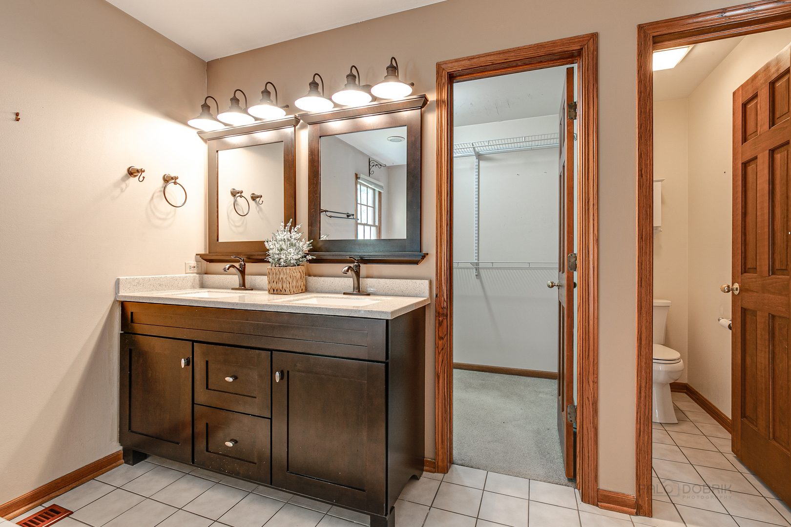4727 Middle Road Gurnee, IL 60031 - Photo 18 of 29 a bathroom with a sink vanity and a mirror