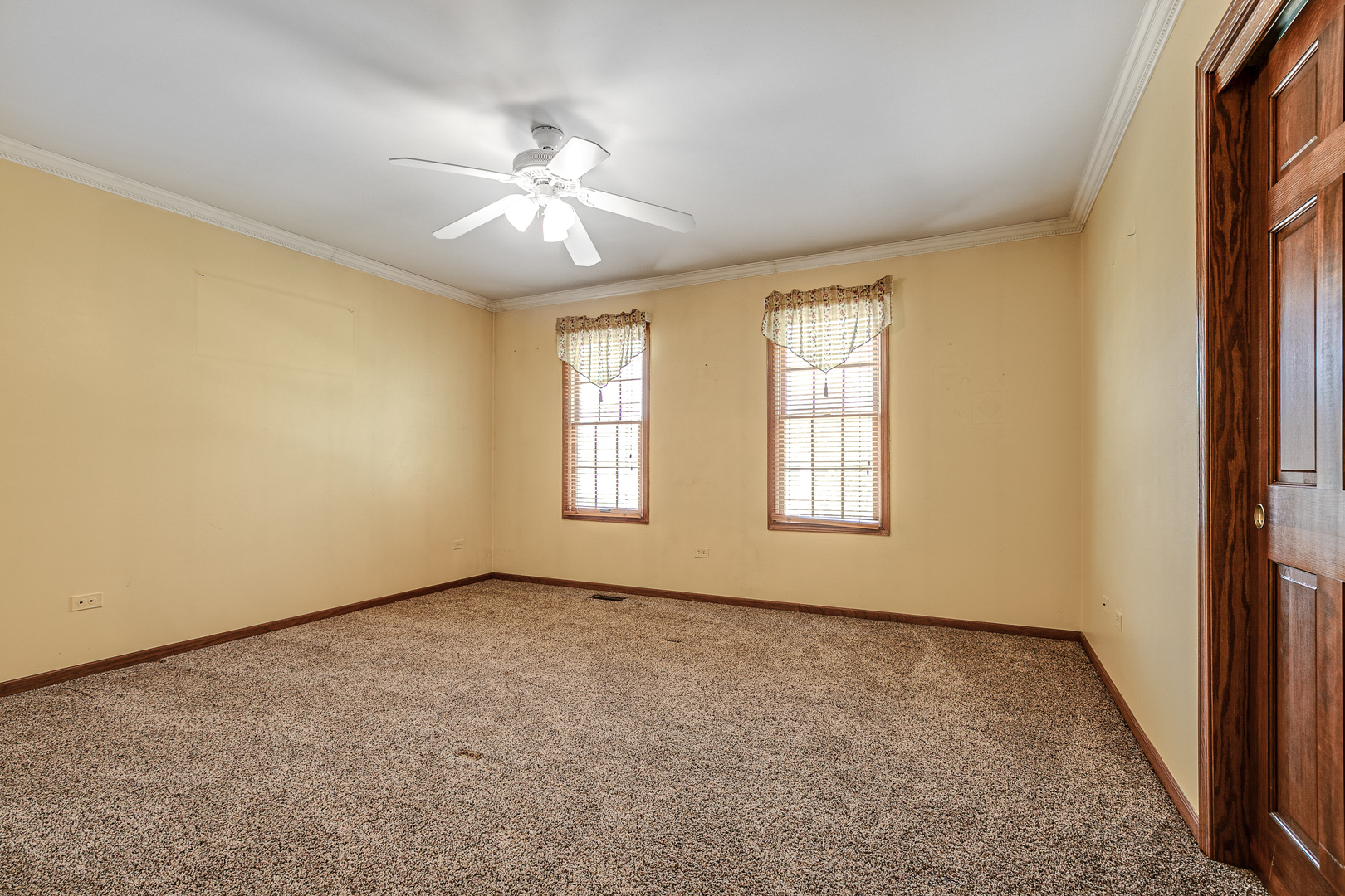 4727 Middle Road Gurnee, IL 60031 - Photo 19 of 29 a view of an empty room with chandelier fan and fire place