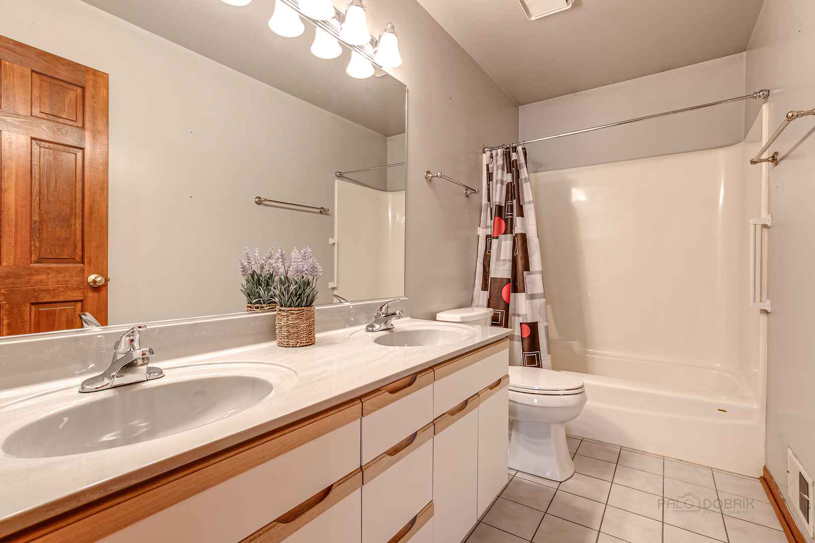 4727 Middle Road Gurnee, IL 60031 - Photo 21 of 29 a bathroom with a granite countertop sink toilet and shower