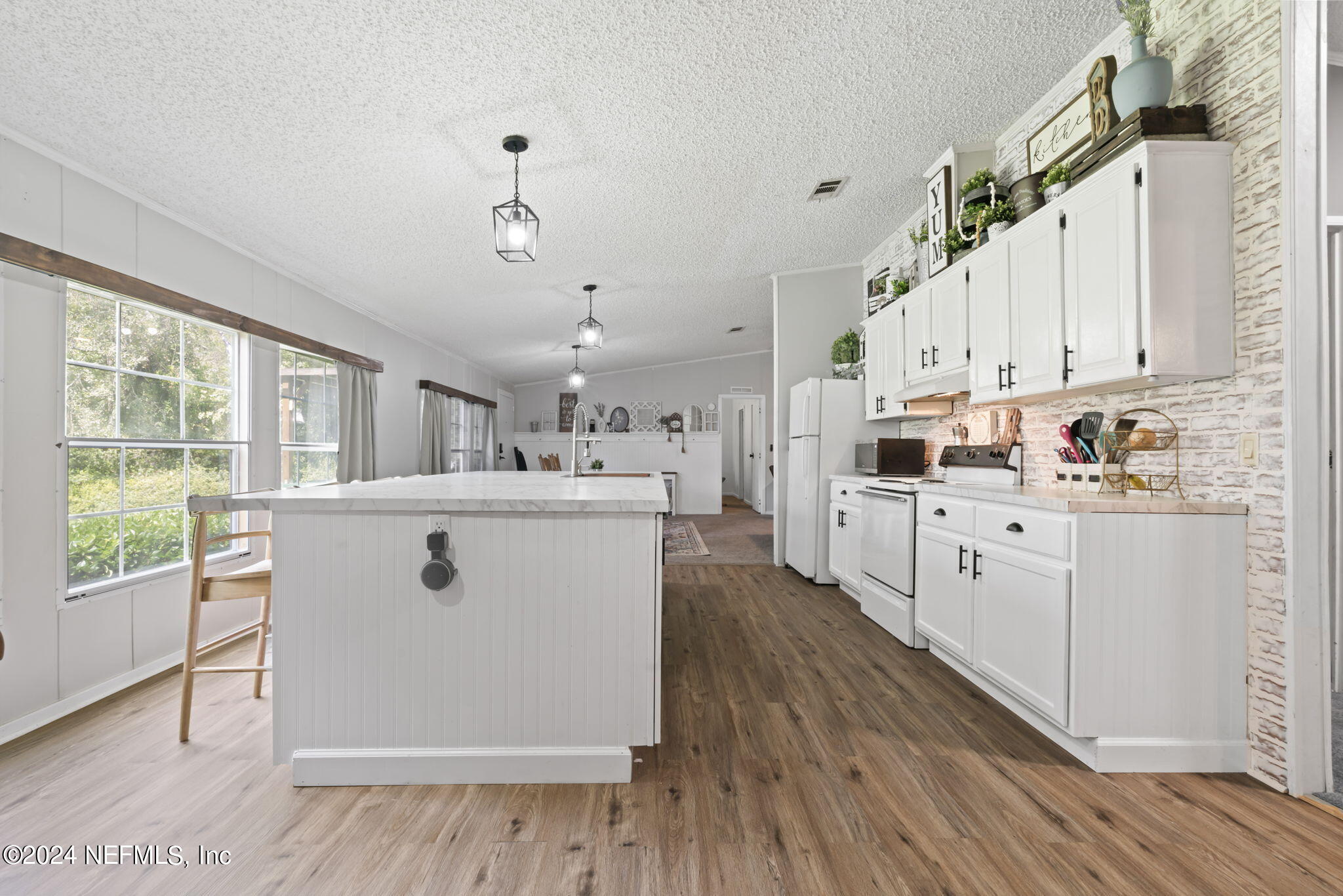 3809 Rancho Road Jacksonville, FL 32221 - Photo 21 of 69 a view of kitchen with wooden floor