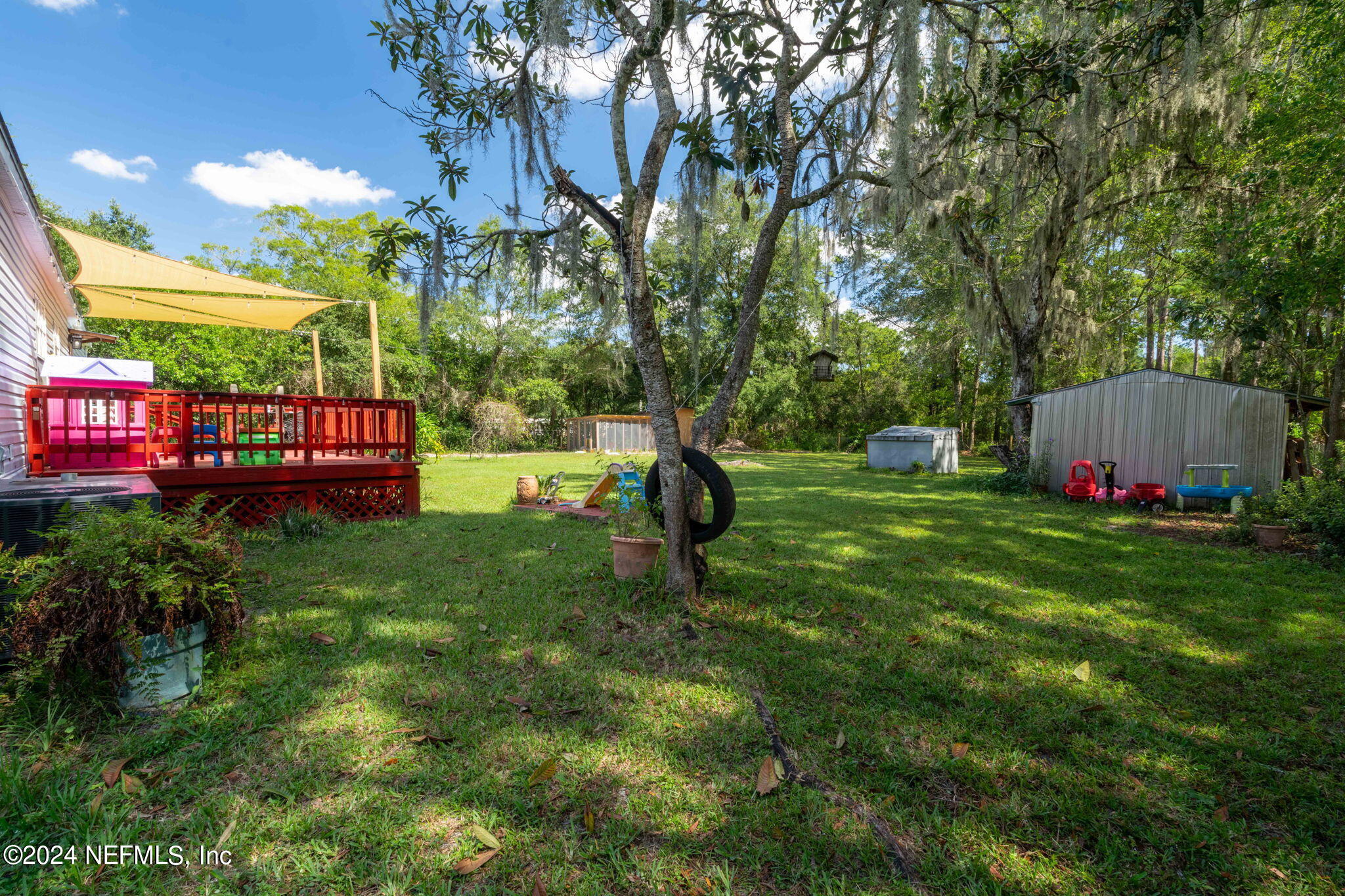 3809 Rancho Road Jacksonville, FL 32221 - Photo 42 of 69 a garden view with a seating space