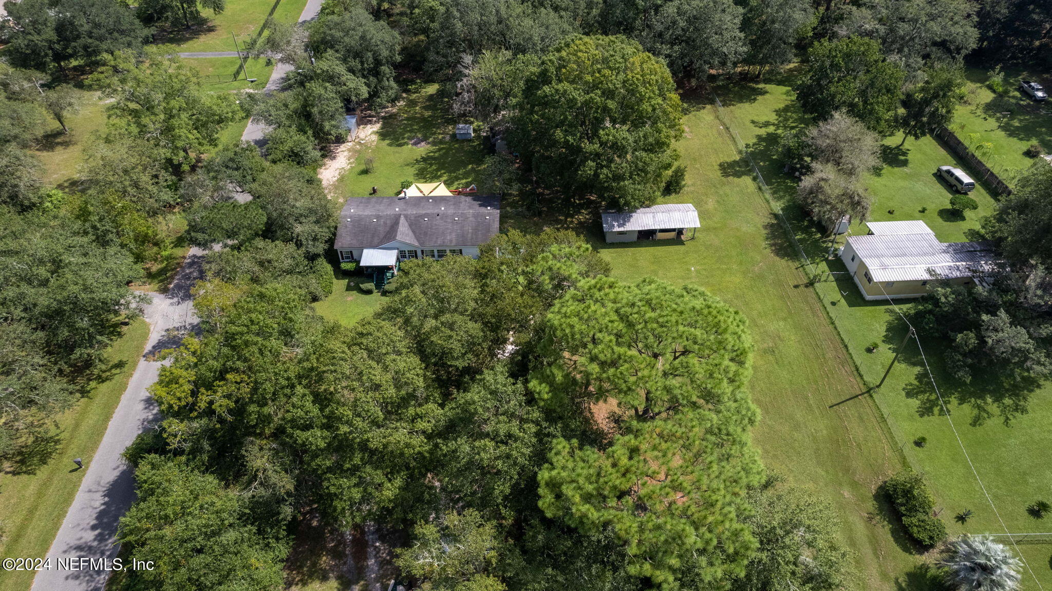 3809 Rancho Road Jacksonville, FL 32221 - Photo 65 of 69 an aerial view of a house with a yard