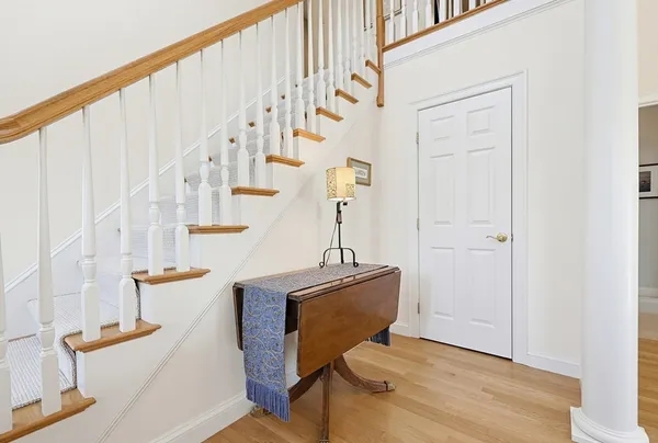 a view of entryway with wooden floor