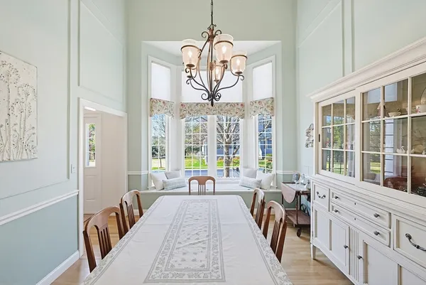 a view of a very nice looking living room with a large window