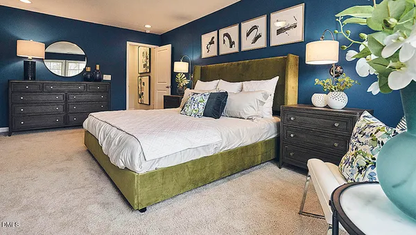a bathroom with a granite countertop shower a sink and a mirror