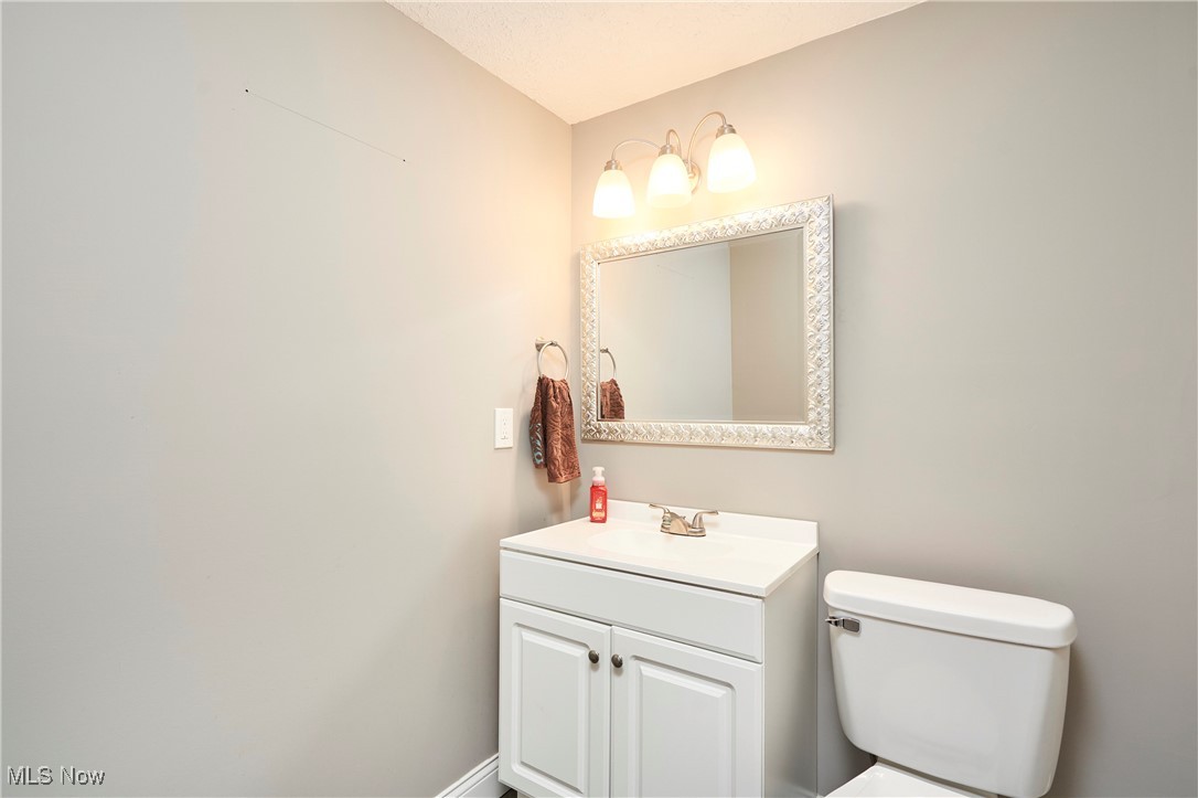 4226 Broadview Road Richfield, OH 44286 - Photo 18 of 24 Bathroom featuring vanity and toilet