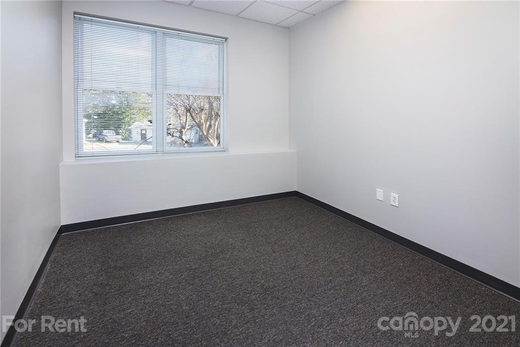 442 South Main Street, Unit 22 Davidson, NC 28036 - Photo 11 of 25 an empty room with a window