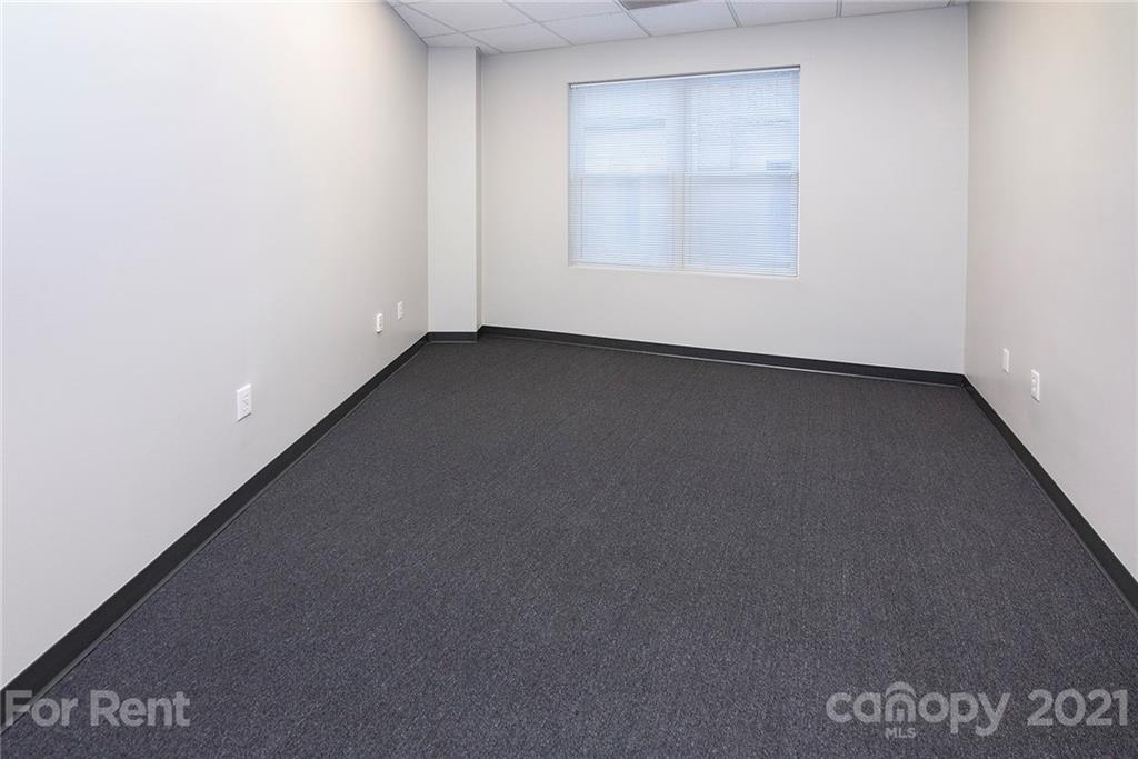 442 South Main Street, Unit 22 Davidson, NC 28036 - Photo 14 of 25 an empty room with a window