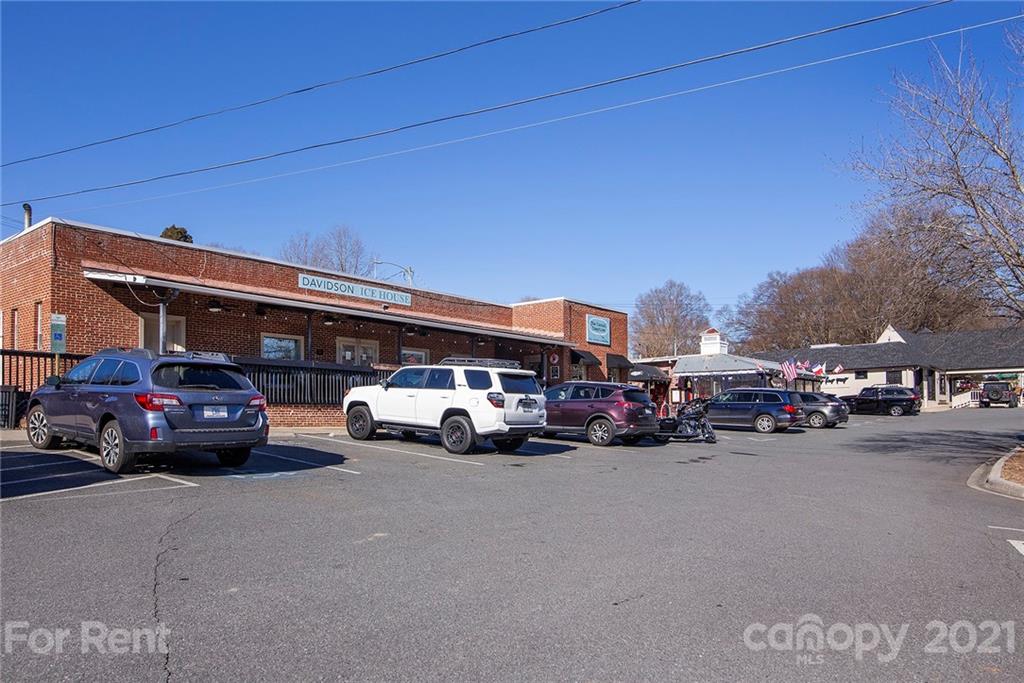 442 South Main Street, Unit 22 Davidson, NC 28036 - Photo 20 of 25 a view of street with parked cars