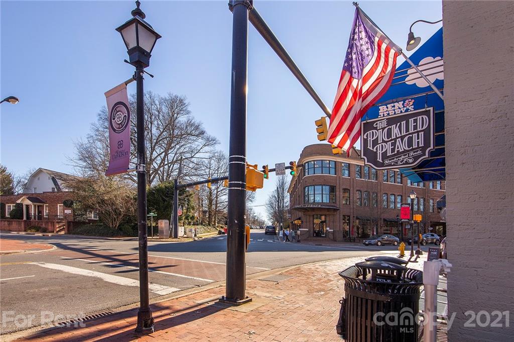 442 South Main Street, Unit 22 Davidson, NC 28036 - Photo 25 of 25 a street sign on a street next to a building