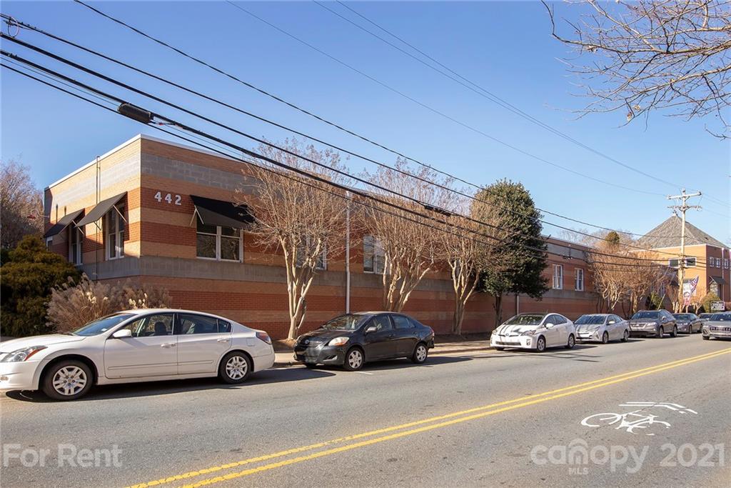 442 South Main Street, Unit 22 Davidson, NC 28036 - Photo 5 of 25 a car parked in front of a building