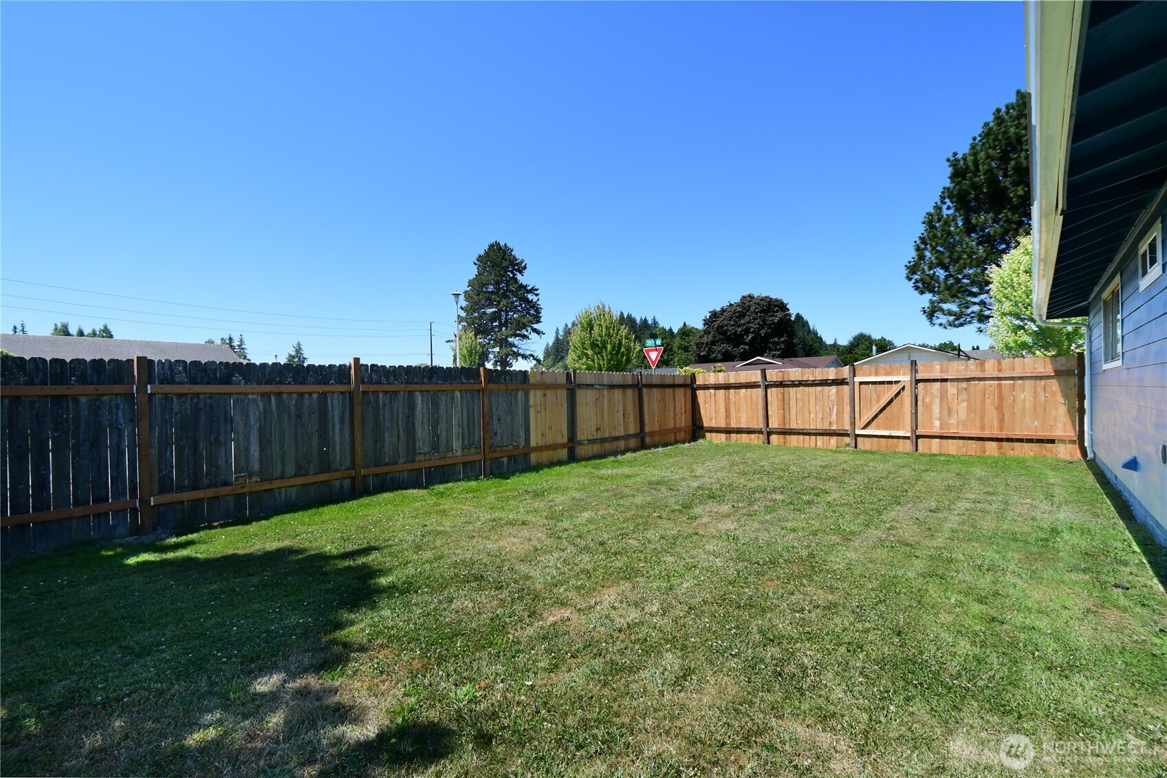 2102 35th Avenue Longview, WA 98632 - Photo 28 of 31 a view of a backyard with a garden