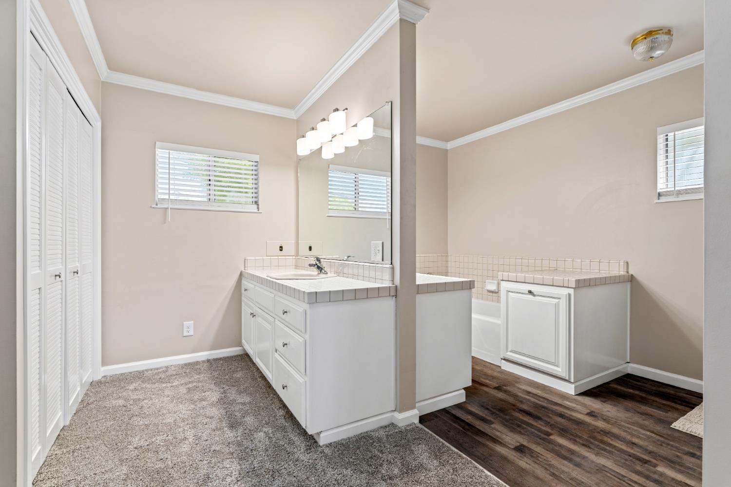 231 South Austin Road Manteca, CA 95336 - Photo 20 of 39 Primary room bath with separate vanity sinks.