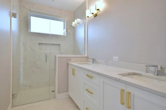 a view of kitchen with cabinets