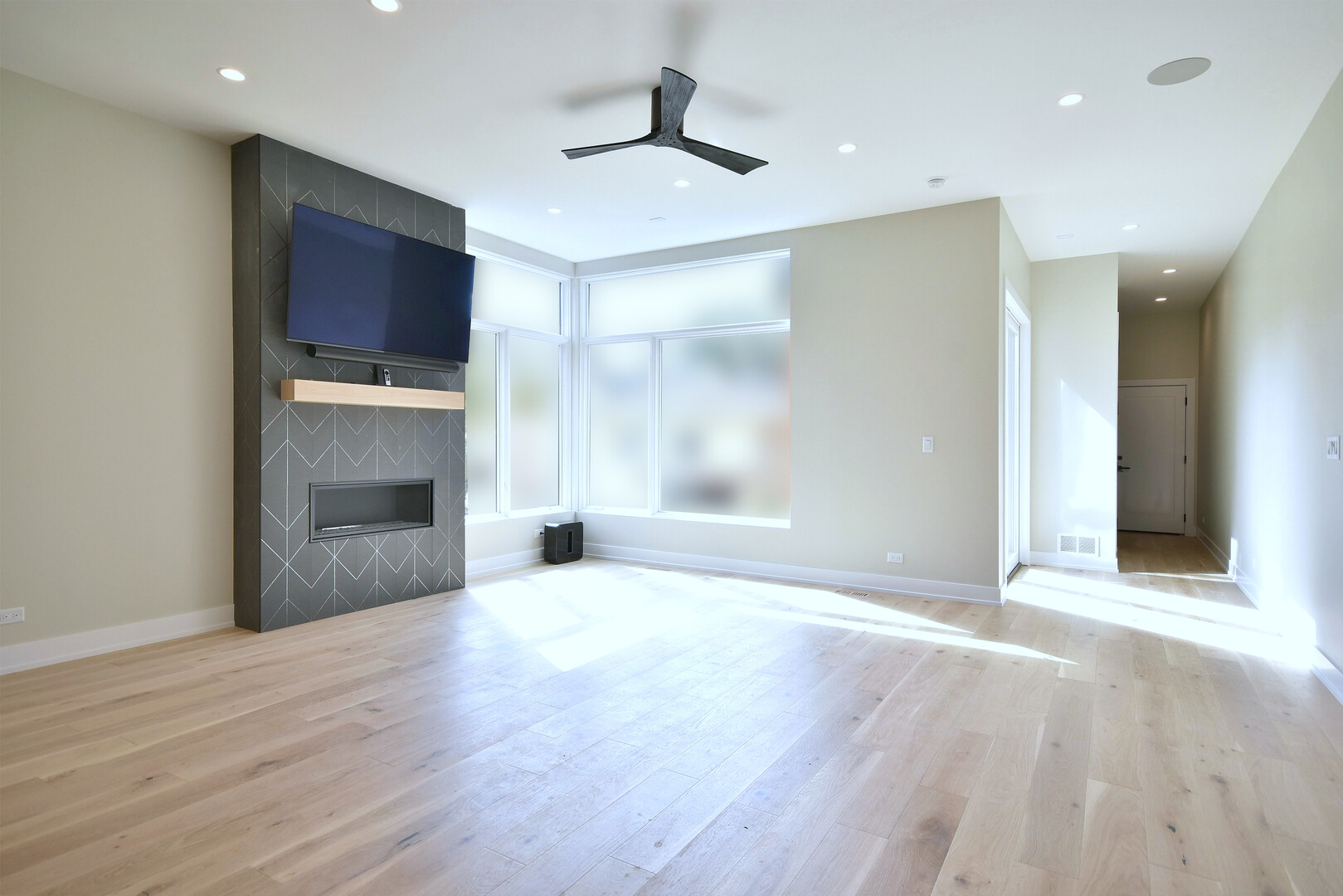 258 North Addison Avenue Elmhurst, IL 60126 - Photo 6 of 13 a view of an empty room with a kitchen and a window