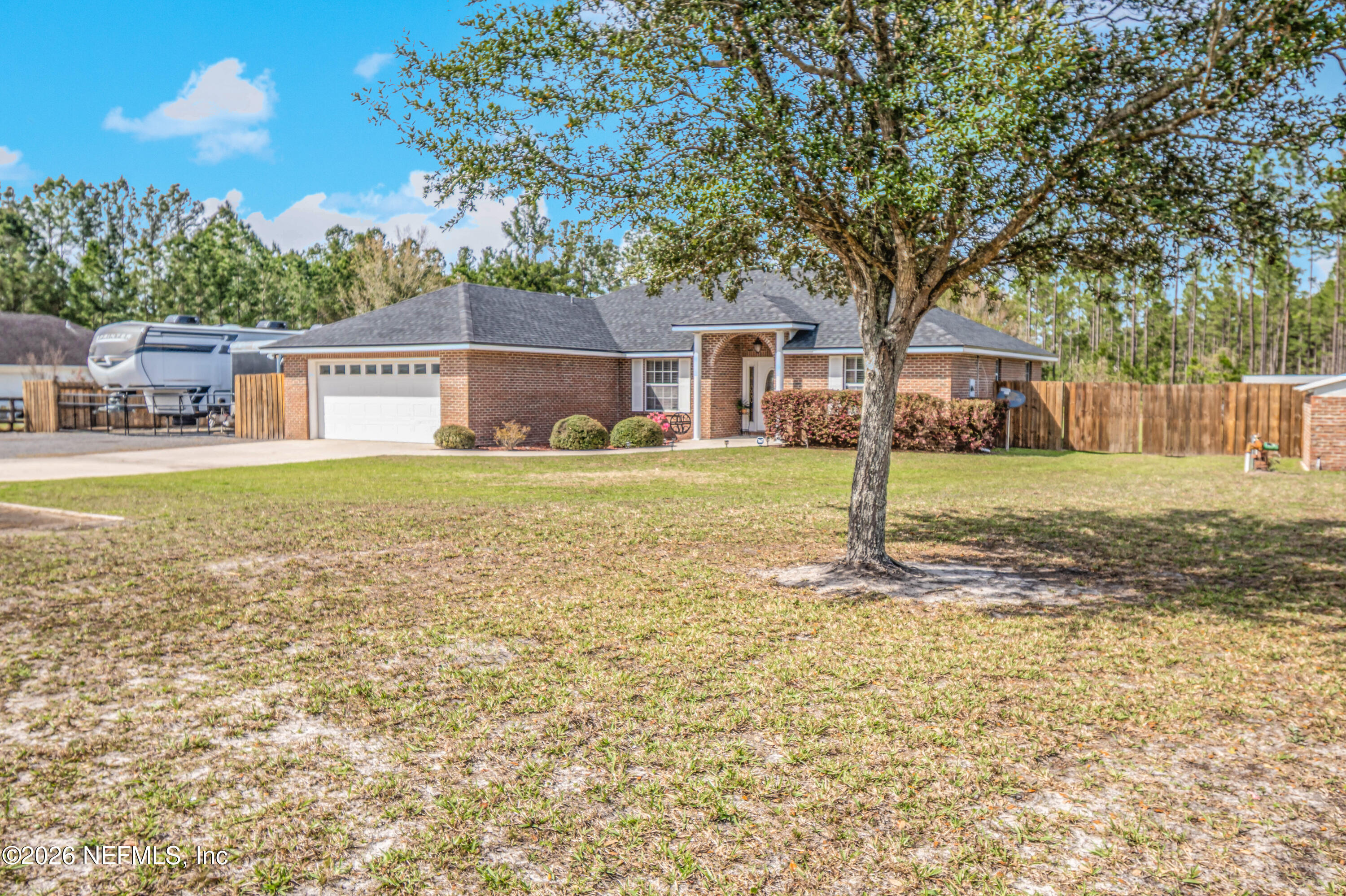 7667 Odis Yarborough Road Glen St. Mary, FL 32040 - Photo 2 of 40 a house view with a outdoor space
