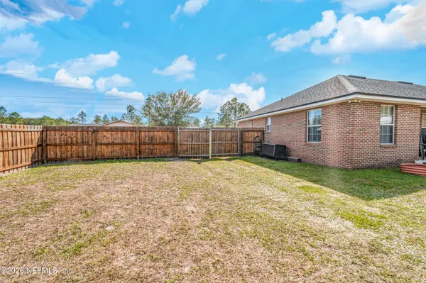 a view of a backyard with a garden