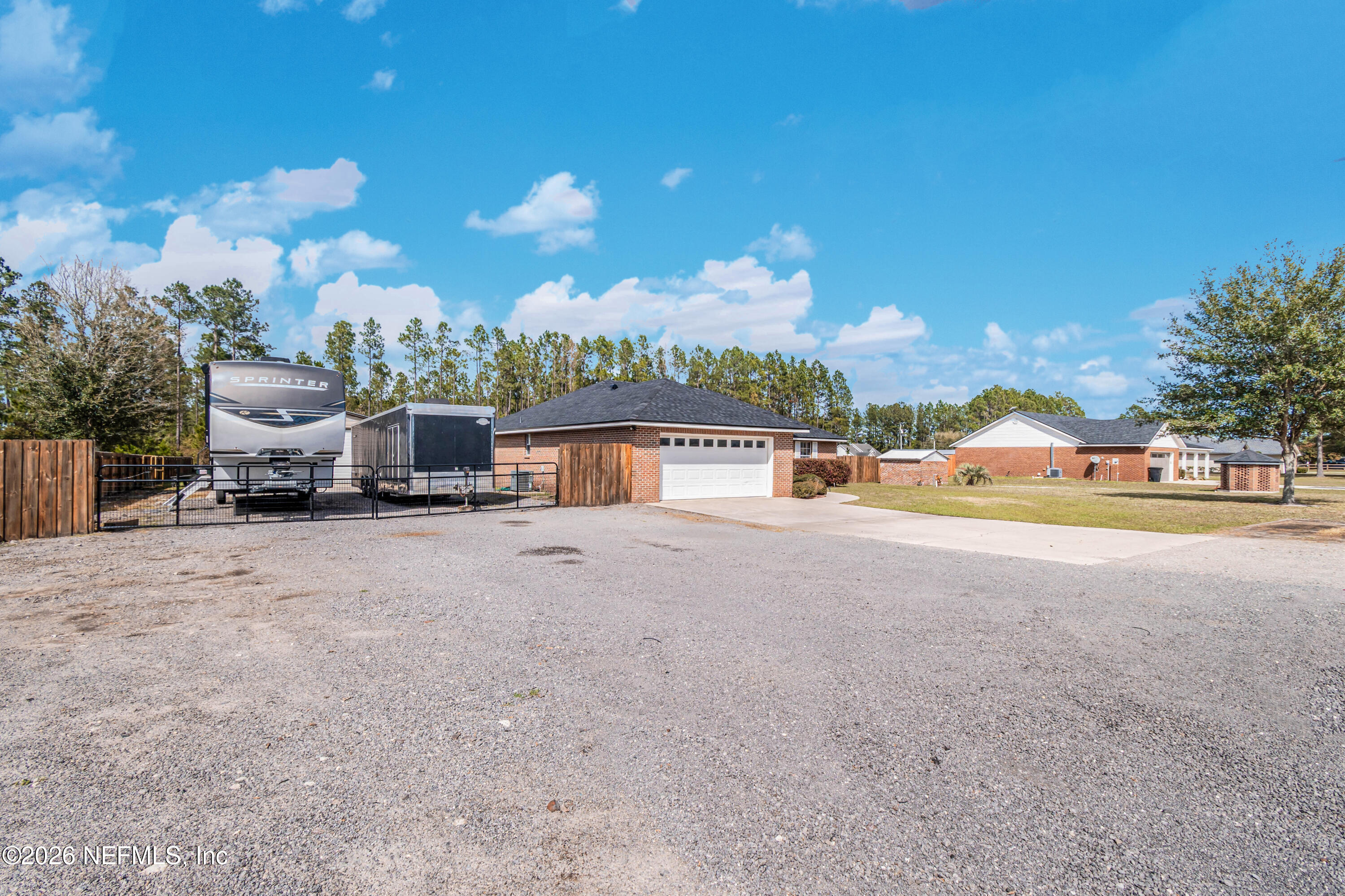 7667 Odis Yarborough Road Glen St. Mary, FL 32040 - Photo 5 of 40 a view of the street