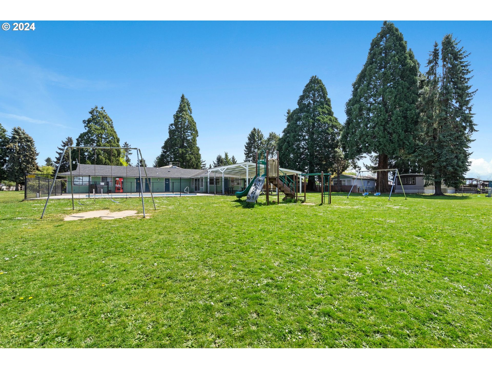 10038 South New Era Road, Unit 98 Canby, OR 97013 - Photo 33 of 34 a view of a park with large trees