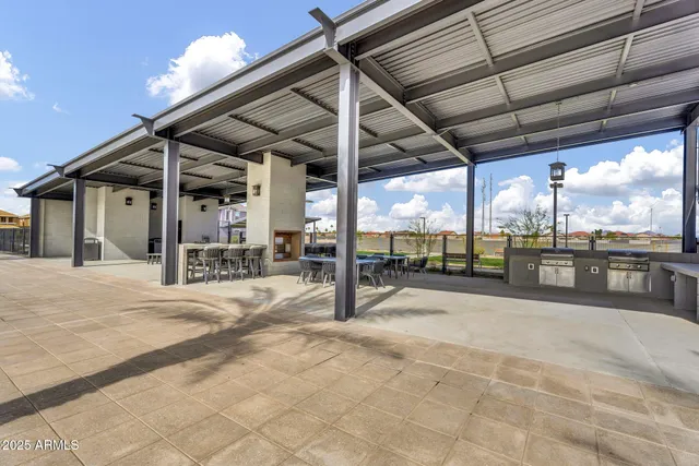 a view of a terrace with trees
