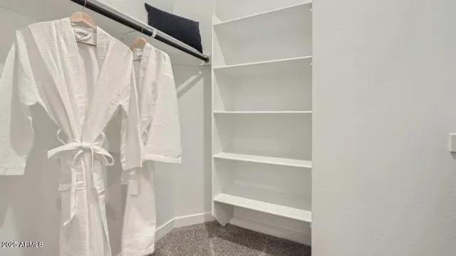 a bathroom with a shower sink vanity granite and a mirror