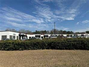2949 Rosebud Road Loganville, GA 30052 - Photo 6 of 42 a view of house with yard and green space