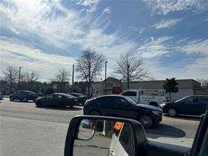 2949 Rosebud Road Loganville, GA 30052 - Photo 7 of 42 a view of street with parked cars