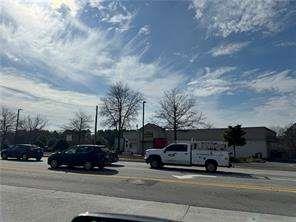 2949 Rosebud Road Loganville, GA 30052 - Photo 8 of 42 a view of street with parked cars