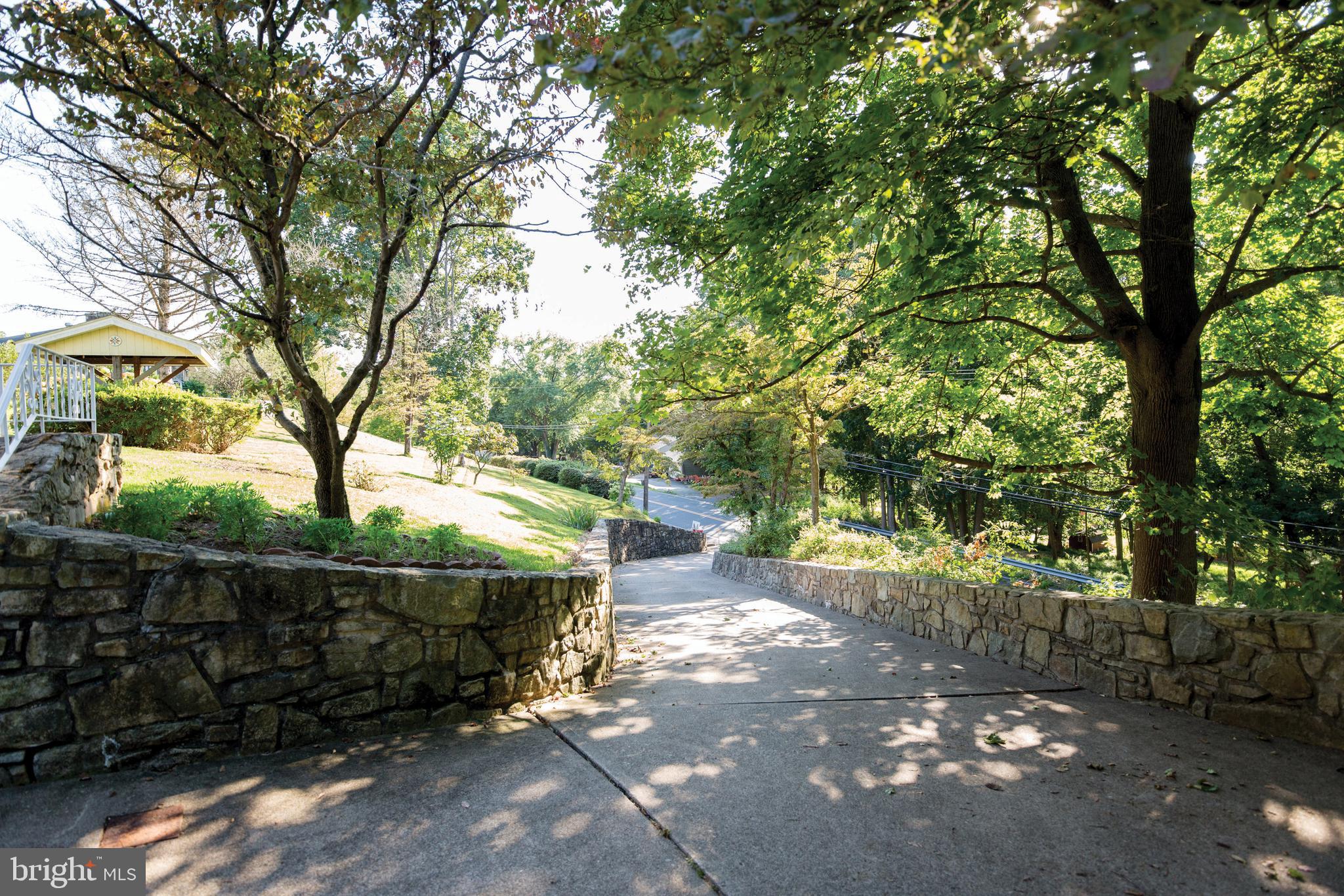 670 Riegelsville Milford Road Milford, NJ 08848 - Photo 26 of 26 Stone Wall Lined Driveway