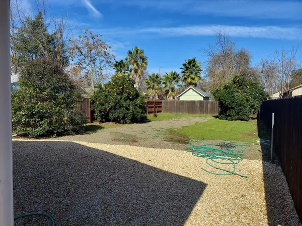 a view of pool table and chairs