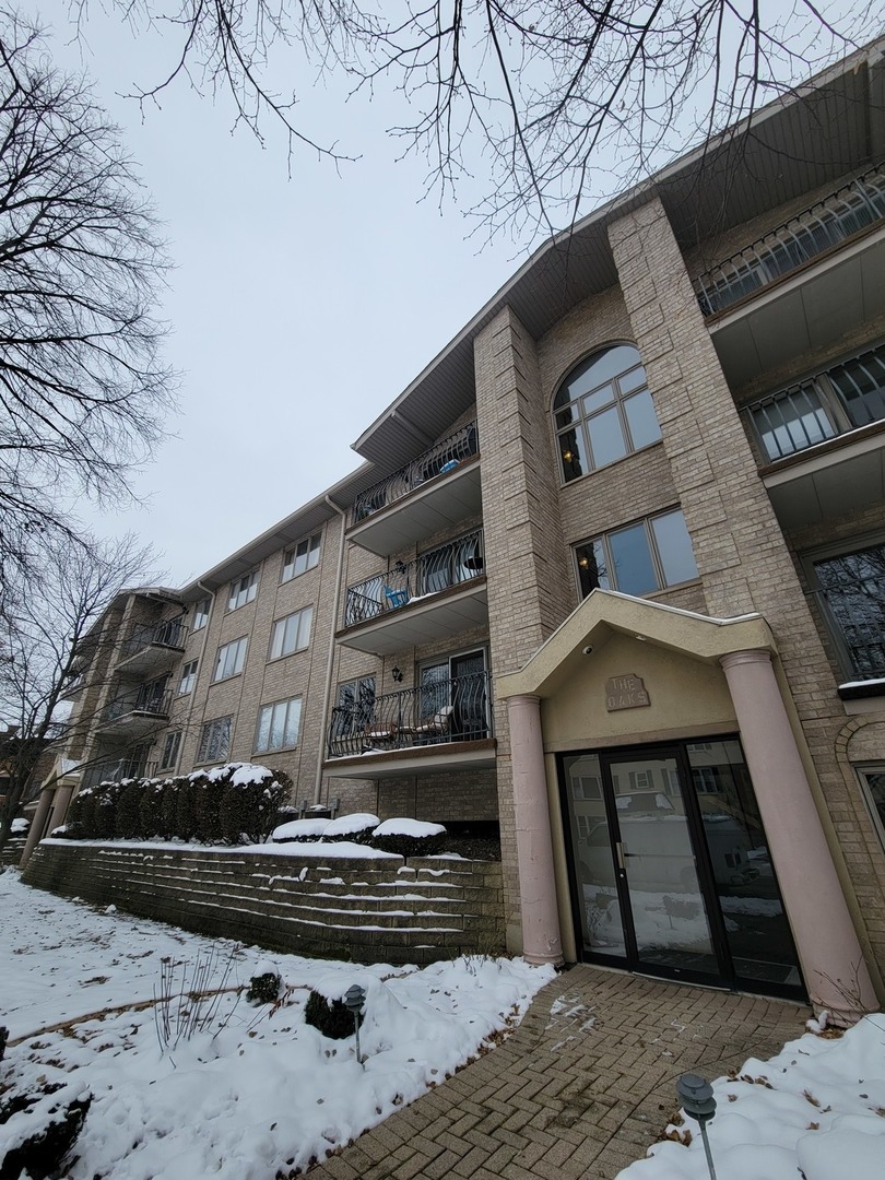 10418 South Keating Avenue, Unit 1A Oak Lawn, IL 60453 - Photo 14 of 15 a front view of a house