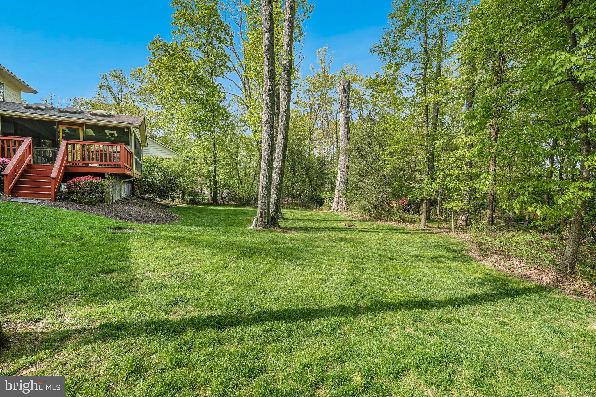 12003 Turf Lane Reston, VA 20191 - Photo 10 of 14 a view of a house with a backyard