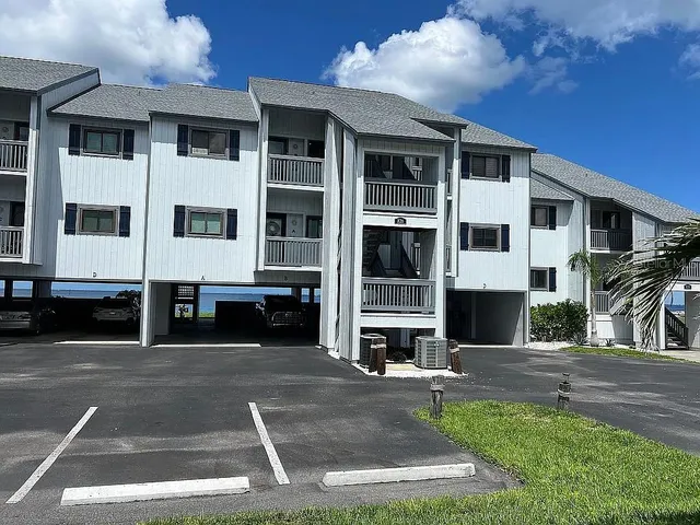 a view of building with yard
