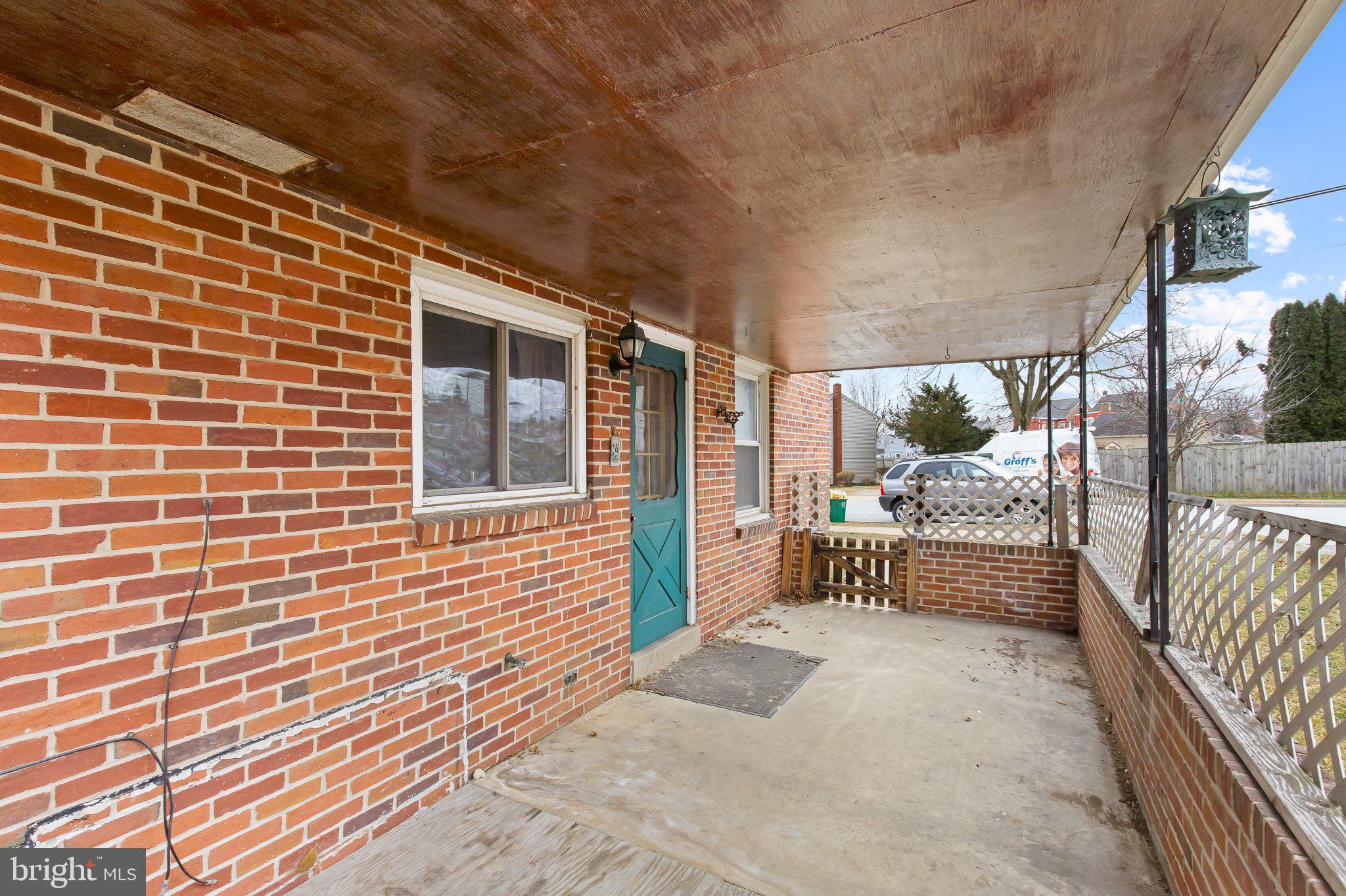 811 Ridge Avenue Columbia, PA 17512 - Photo 13 of 14 Covered Side Porch