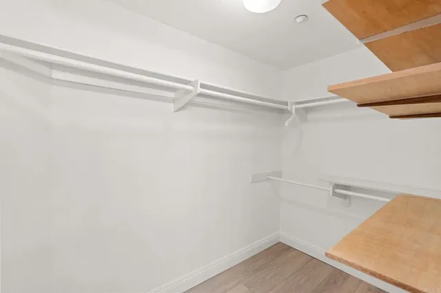 a view of an empty walk in closet