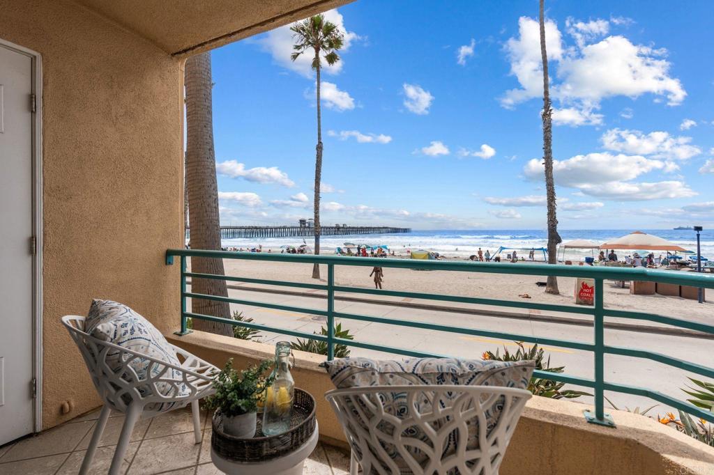 400 The Strand North, Unit 27 Oceanside, CA 92054 - Photo 3 of 25 a view of a balcony with furniture