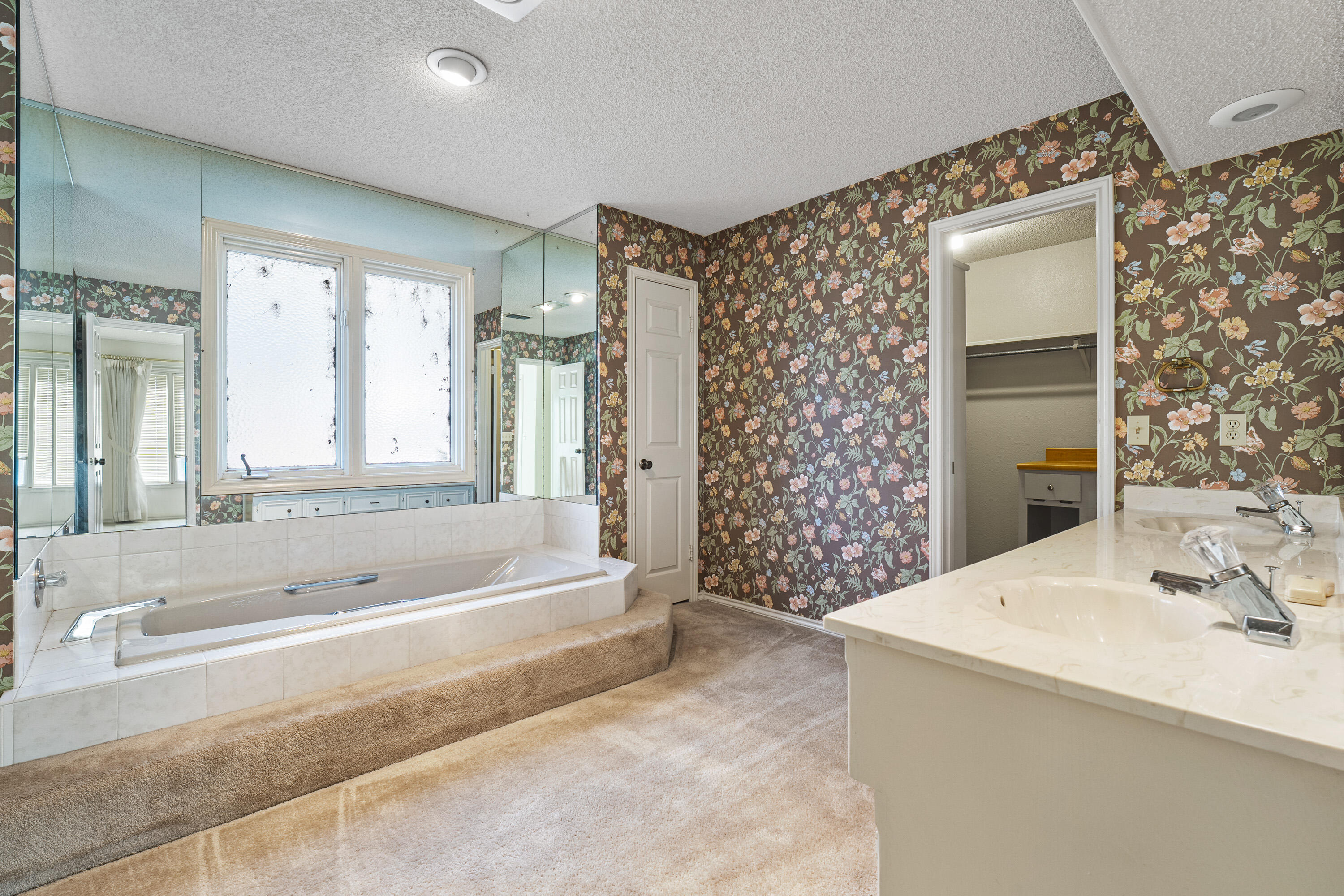 12 Foothill Drive Ransom Canyon, TX 79366 - Photo 15 of 36 a spacious bathroom with sink shower and bathtub