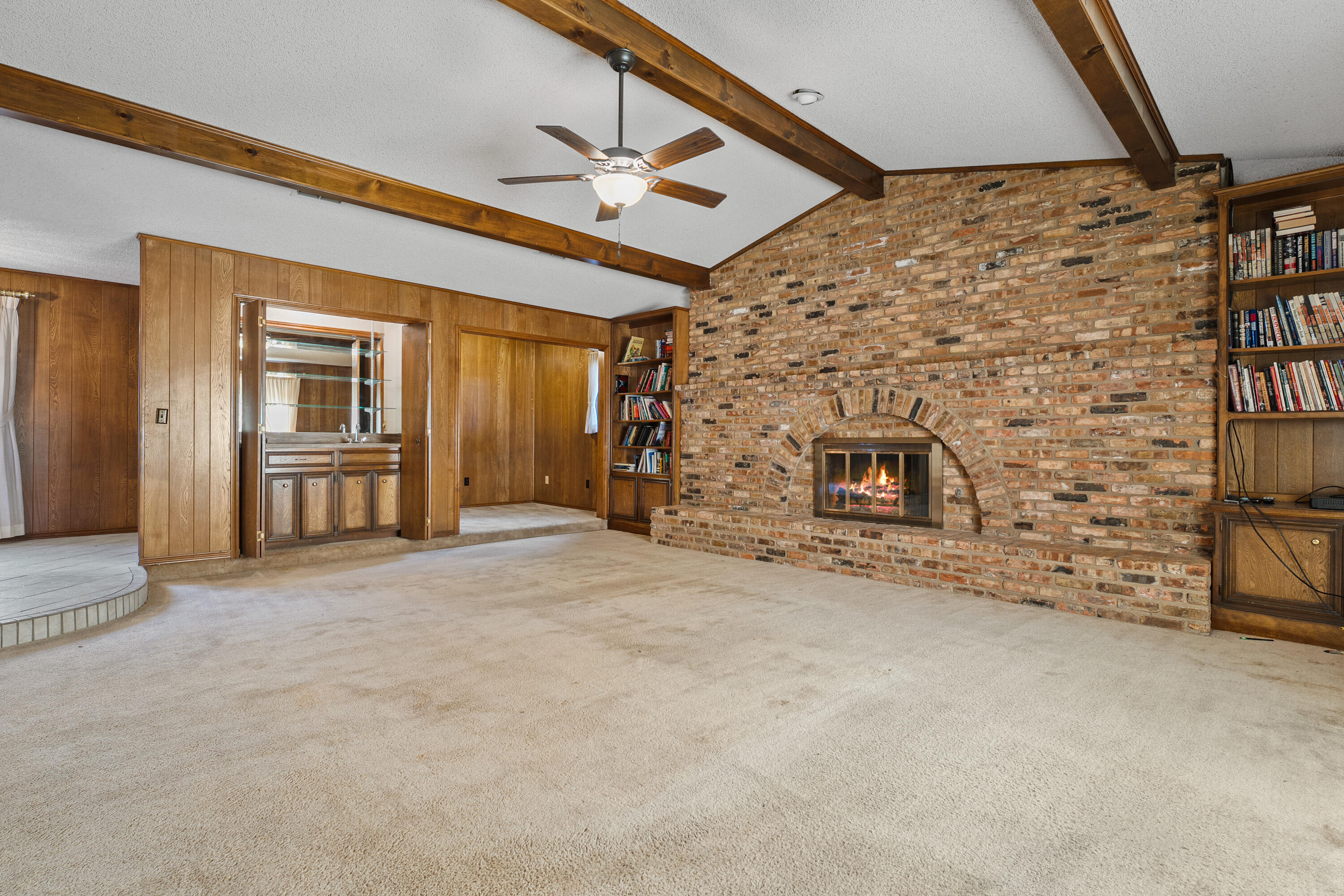 12 Foothill Drive Ransom Canyon, TX 79366 - Photo 22 of 36 a view of an empty room with a fireplace