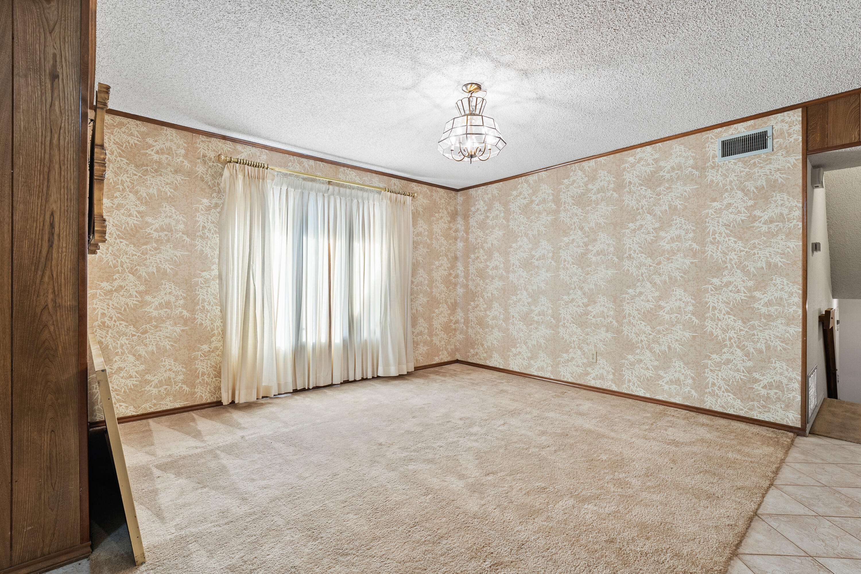 12 Foothill Drive Ransom Canyon, TX 79366 - Photo 26 of 36 wooden floor in an empty room with a window