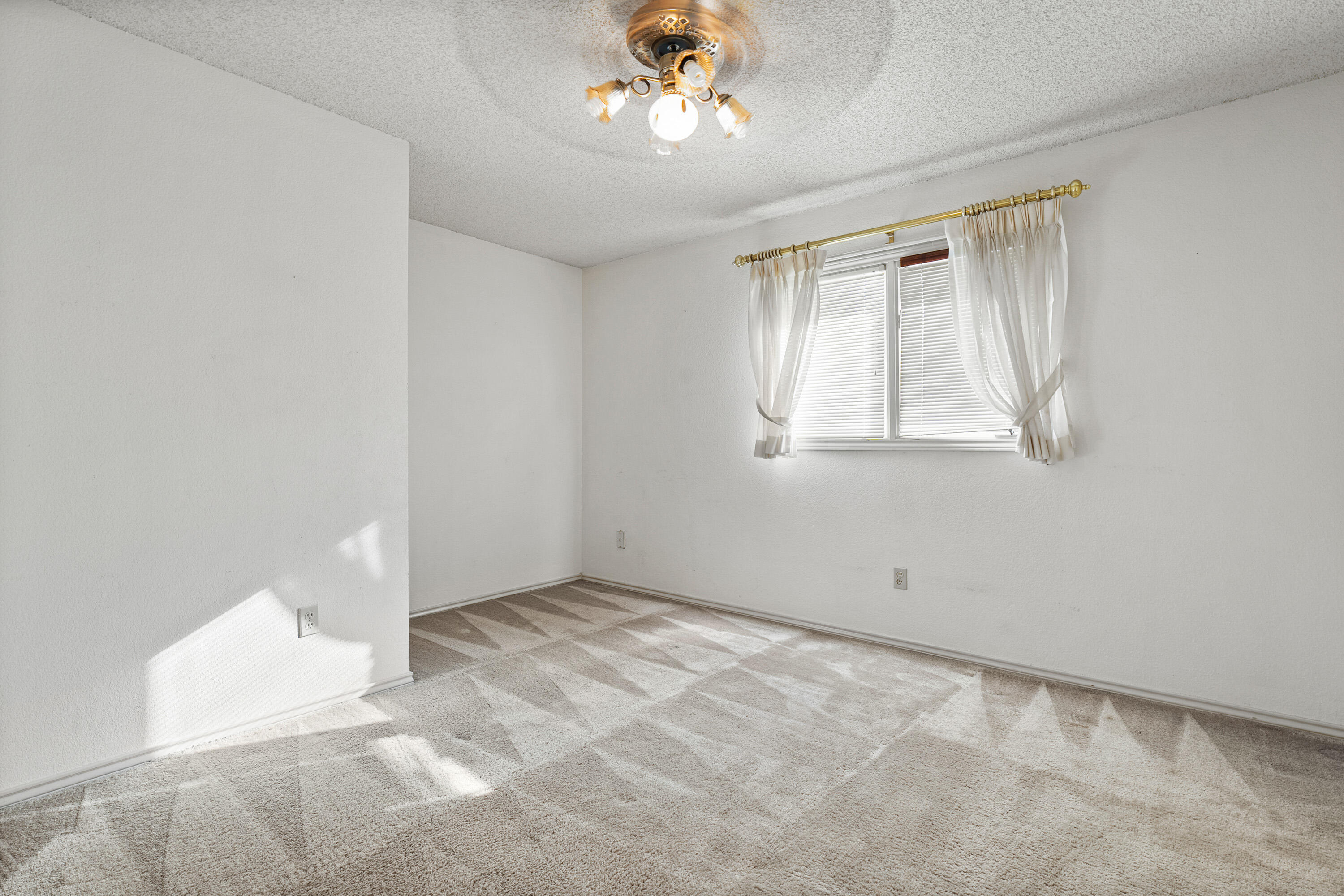 12 Foothill Drive Ransom Canyon, TX 79366 - Photo 30 of 36 wooden floor in an empty room with a window