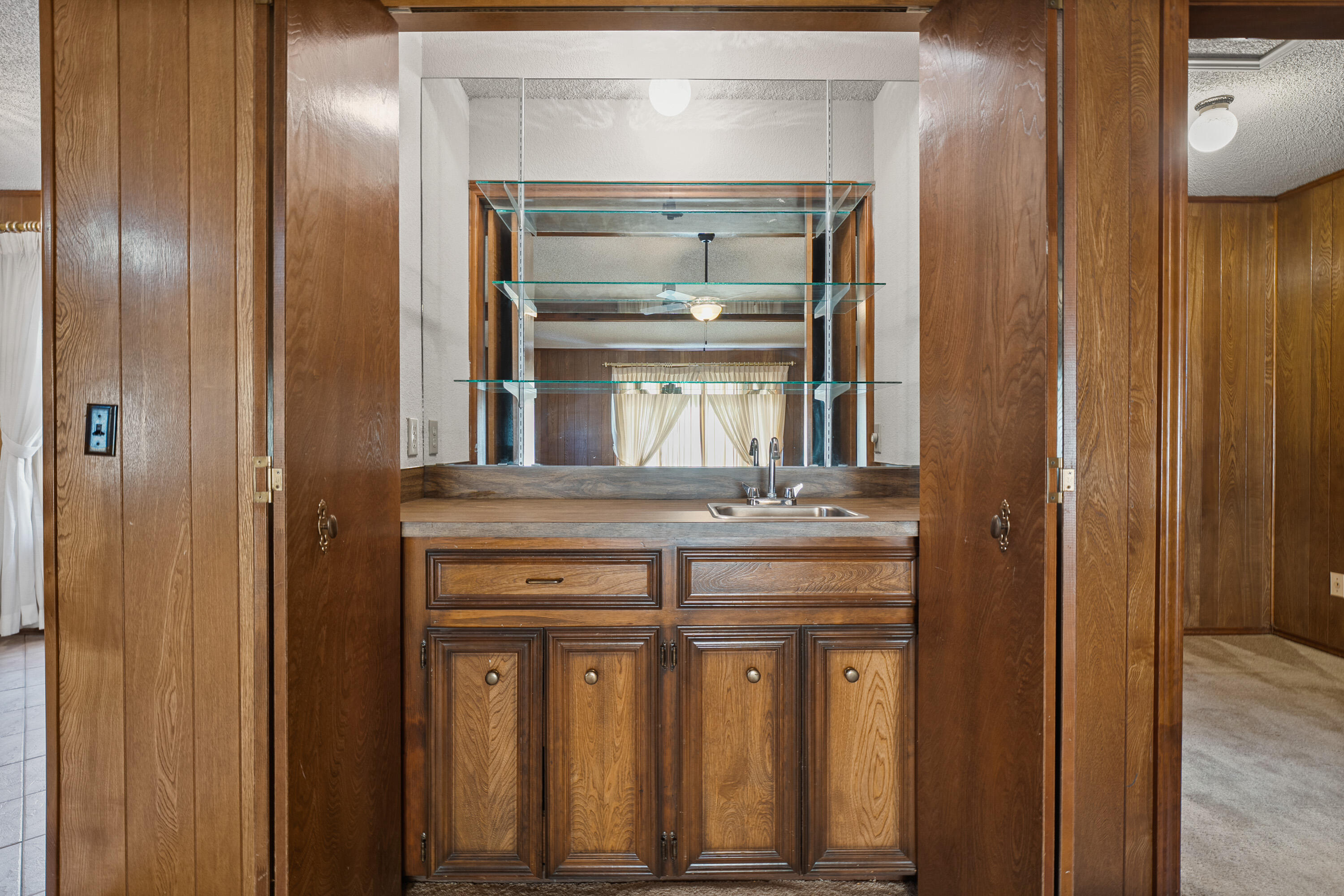 12 Foothill Drive Ransom Canyon, TX 79366 - Photo 6 of 36 a view of a hallway with wooden cabinet